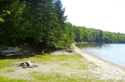Wadleigh Pond Beach Campsite campsite in Caucomgomoc Region Campsites